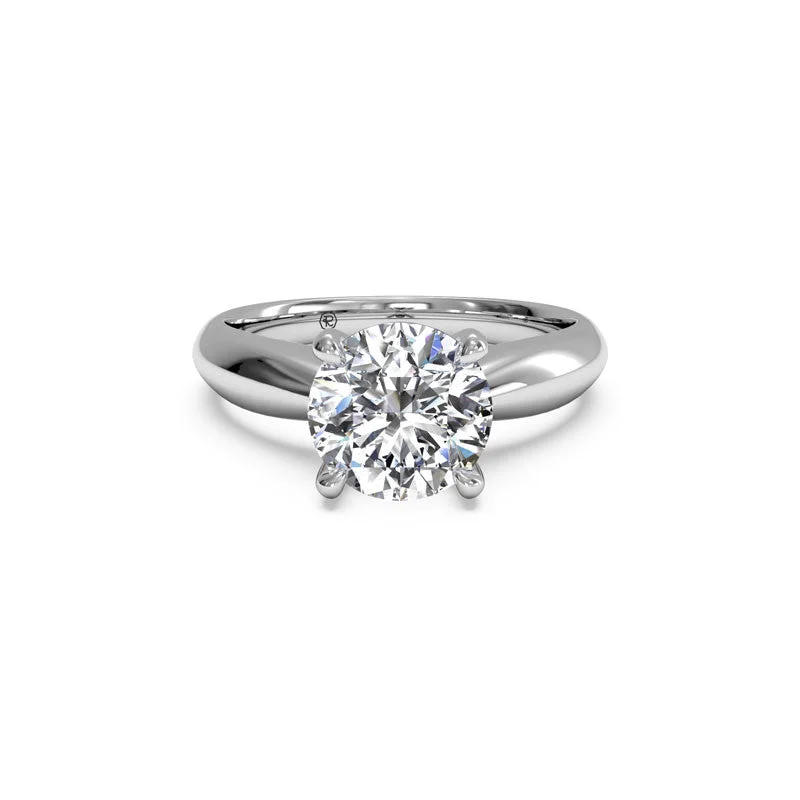 handmade rings with diamonds-Tapered Surprise Diamond Round Diamond Engagement Ring